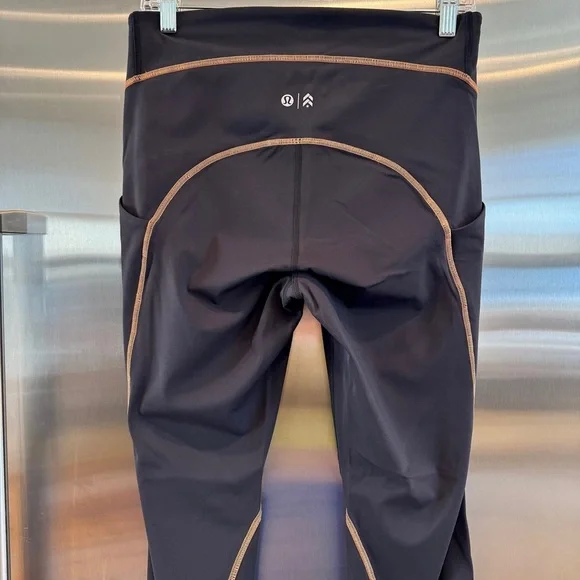 NWT Lululemon Power Thru Legging x Barry’s Tights in Black Orange colour seam​